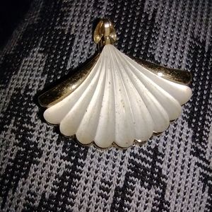 A sea shell pendant for necklace